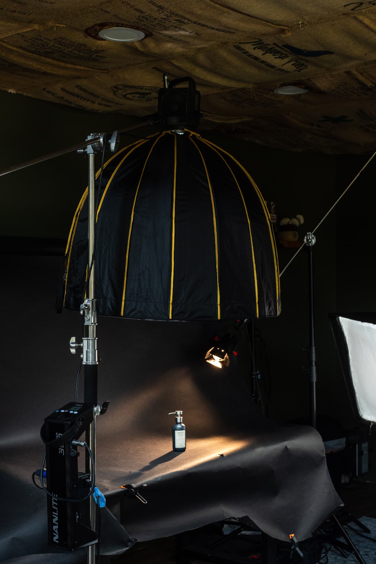 Behind the scenes lighting setup for the ARETE product shoot